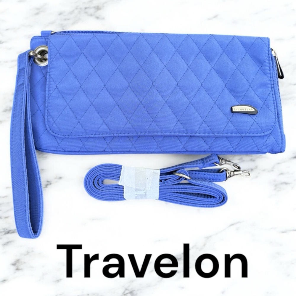 Travelon-carry on crossbody/wristlet/wallet. French blue. A travel essential EUC